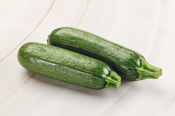 Raw green ripe zucchini vegetable
