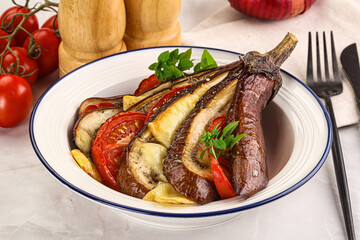 Baked tomato with mozzarella and tomato