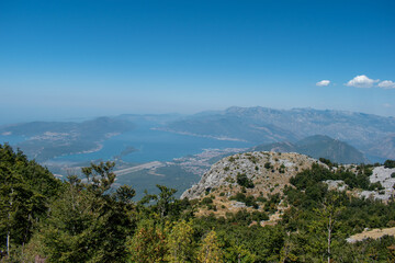 view from the top of the mountain on Boka bay in Montenegro on a sunny day.  Adriatic Sea Bay seen from mountains.