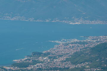 Obraz premium view from the top of the mountain on Boka bay in Montenegro on a sunny day. Adriatic Sea Bay seen from mountains.