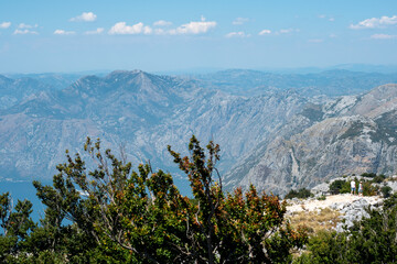 view from the top of the mountain on Boka bay in Montenegro on a sunny day. Adriatic Sea Bay seen from mountains.