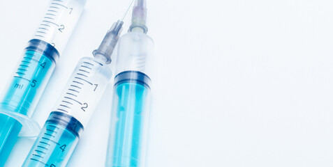 Disposable plastic syringe prepared for injection and vaccination in the hospital. The concept of medicine and health