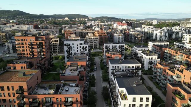 Drone video over Hasle, Oslo, with L&oslash;ren in the background, one area with many new buildings, mostly housing