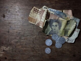 Indonesian currency rupiah on brown table background