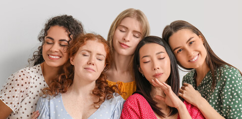 Beautiful young happy women on white background. Women history month