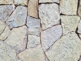 minimalistic stone wall paper background picture - detailled close up photography of a Wall in Tbilisi, Georgia