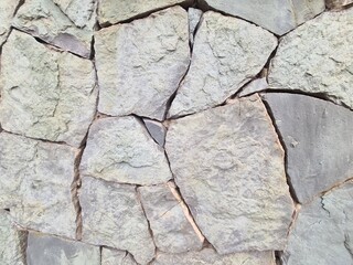 minimalistic stone wall paper background picture - detailled close up photography of a Wall in Tbilisi, Georgia