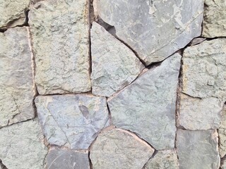 minimalistic stone wall paper background picture - detailled close up photography of a Wall in Tbilisi, Georgia