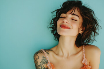 A close up of a woman's face with tattoos and her eyes closed