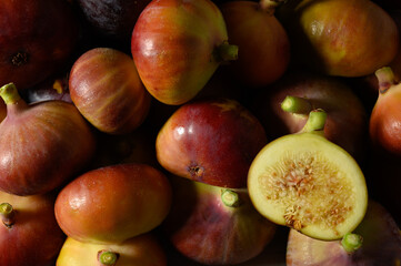 Close-up of a pile of fresh figs in an array of colors