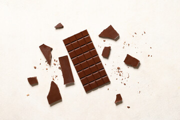 Sweet chocolate bar on white background