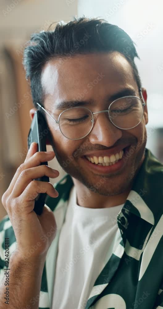 Poster man, phone call and joke at home with conversation and communication in living room with smile. happ