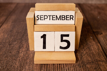 September 15 calendar date text on wooden blocks with copy space for ideas or text.
