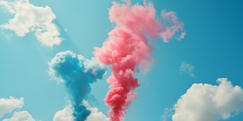 Colorful blue and pink smoke clouds rise into clear sky, creating vibrant contrast against fluffy white clouds, celebrating joyful outdoor event, gender reveal or festival.