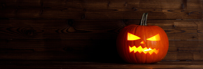 halloween pumpkins on wooden background