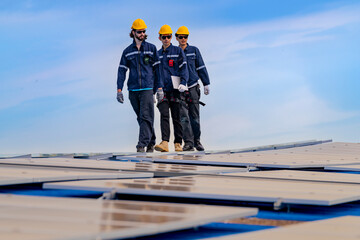 engineer man inspects construction of solar cell panel or photovoltaic cell by electronic device. Industrial Renewable energy of green power. factory worker working on tower roof.