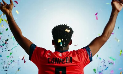 Animation of african american male soccer player over confetti - Powered by Adobe