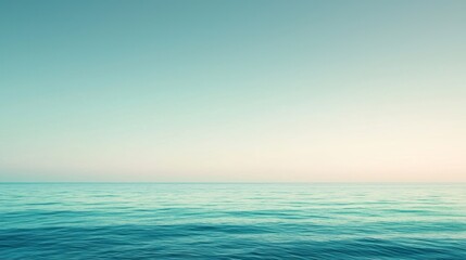 Fototapeta premium Tranquil ocean meeting pastel sky, creating serene scene. Minimalistic nature beauty captured in seascape, perfect for summer thoughts. Soft focus enhances zen atmosphere with soothing hues blending