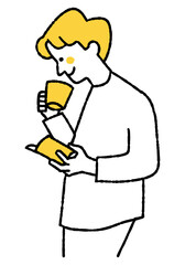 Man reading a book while drinking coffee