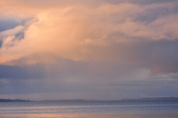 Rain pouring from storm clouds into inner Hauraki Gulf viewed from Takapuna. Location: Takapuna Auckland New Zealand