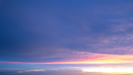 Breathtaking Sunset Over the Horizon with Colorful Clouds