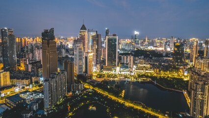Stunning Night Cityscape Featuring Skyscrapers and Waterfront Serenity