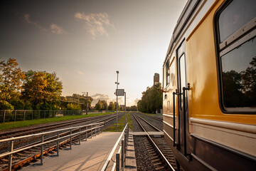 Selective blur on a regional train, a diesel DMU of latvian railways ready for departure in Sigulda to Riga at dusk. It's one of the main public transportation axis of Latvia.