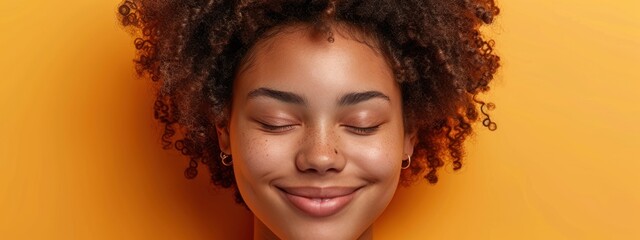 Fototapeta premium Smiling Woman with Closed Eyes
