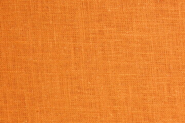 orange hemp viscose natural fabric cloth color, sackcloth rough texture of textile fashion abstract background