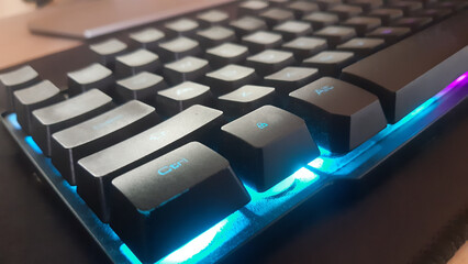 Close-Up of Backlit Mechanical Keyboard Showcasing Textured Keycaps and Bright LED Lighting. Ideal for Gaming or Office Use with Smooth Typing and Stylish Design.