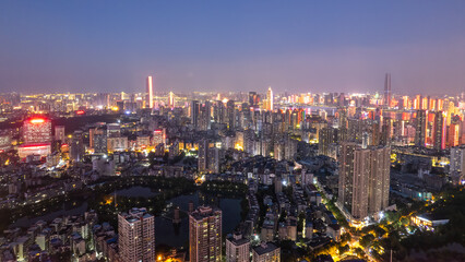 Vibrant Cityscape at Dusk Showcasing Urban Life and Architecture