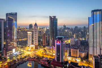 Stunning Aerial View of a Vibrant City Skyline at Sunset
