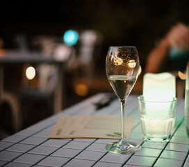 glass of champagne on the table
