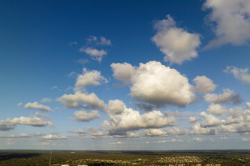 Blue sky with white clouds. Bright summer skyscape