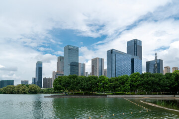 Modern Urban Skyline Reflected in a Serene Lake