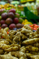 Ginger or Kion (Zingiber officinale) piled  at a local market in the city of Medellin, Colombia.