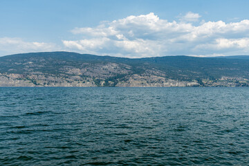 Fototapeta premium summer time July Okanagan Lake British Columbia Canada water landscape sky with clouds