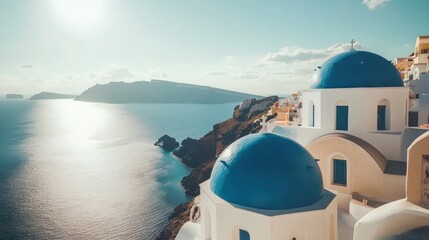 Fototapeta premium Picturesque Santorini: Blue Domed Churches