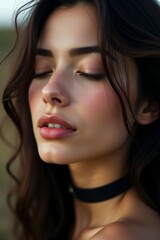 Fototapeta premium A dark-haired woman is sleeping and thinking about something.