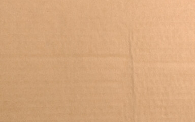 Brown paper texture image. Rough light brown kraft paper banner background with pulp texture