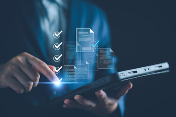 Checklist business performance monitoring concept, Business using tablet online survey filling out...