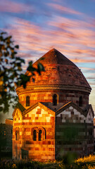 3 Kumbetler or Emir Saltuk Tomb in Erzurum, bathed in the warm light of sunset, representing heritage, history, and timeless spirituality.