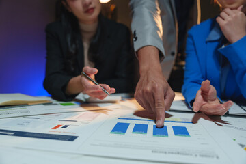 Asian Business people meeting time working with new startup project. Idea presentation, analyze plans. Business Discussing some business ideas. Teamwork concept.