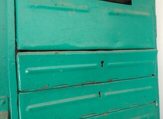 old metal mailbox in an apartment building close up