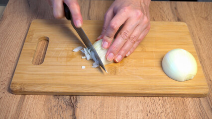 Slicing Onion on Cutting Board