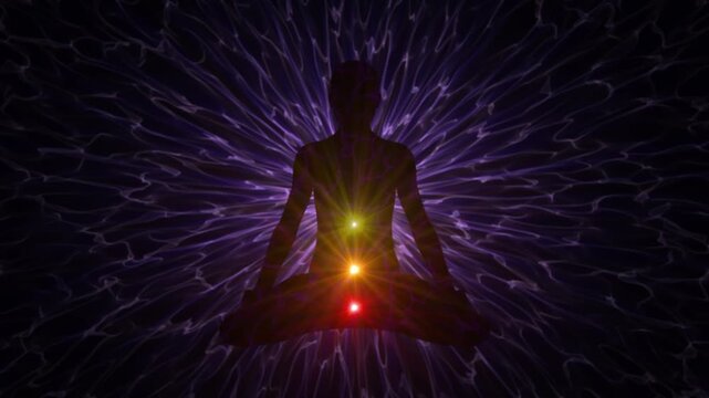 Meditation background with chakras and kundalini for yoga and spiritual practice visualization. Bright colorful lights of body energy emerge and disappear on a dark silhouette of yogin. Loop 4K 60fps