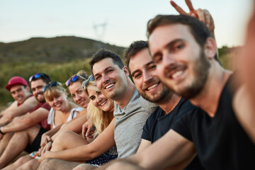 Friendship, silly or people in nature for selfie, travel or freedom on holiday. Men, women or smile in field for trust, relationship development or excited for music festival with reunion on vacation