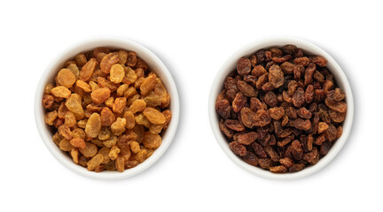 Bowl plates with sweet healthy raisins made from green grapes isolated on white background.Top view.
