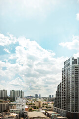 Wide view of the big city at noon The building has an observation deck and a clear sky at noon.