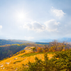 mountain valley  at the bright sunny autumn day